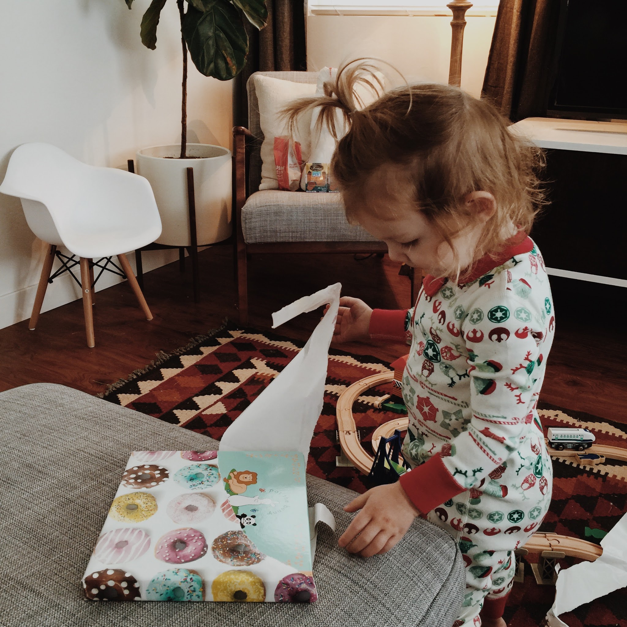 Evelyn Opening a present